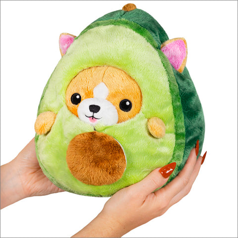 Image shows a stuffed corgi inside an avocado suit
