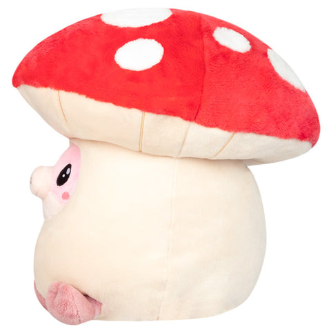 A side view of the pig in the mushroom suit