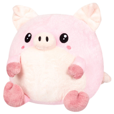 The plush pig outside of the mushroom suit