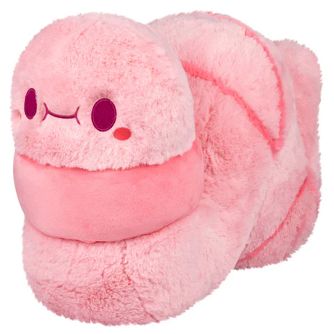 Image shows a pink stuffed worm. It is chubby.