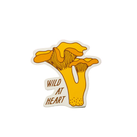 Sticker with a mushroom design and 'Wild at Heart' text on a white background