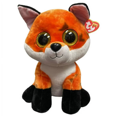 Image shows a stuffed fox with large golden plastic eyes