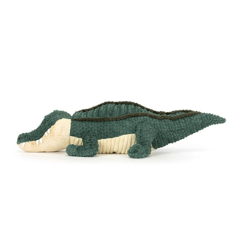 Image shows a side view of the stuffed alligator