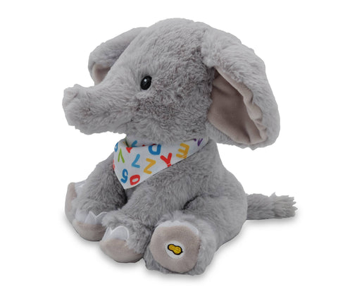 Side view of a plush elephant wearing an alphabet bandana on a white background