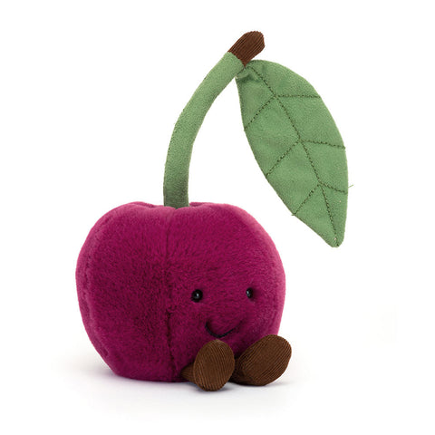 Image shows a stuffed cherry with a stem and leaf. It has a happy face and feet.