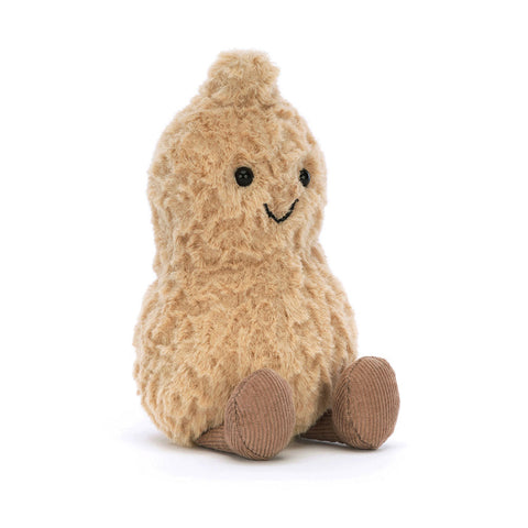 Image shows a stuffed peanut. It has a happy face and feet.