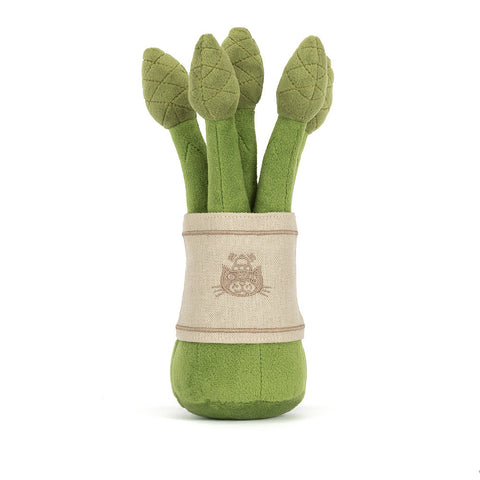 Back view of a plush toy asparagus. It has the Jellycat logo embroidered onto the tan wrapping.