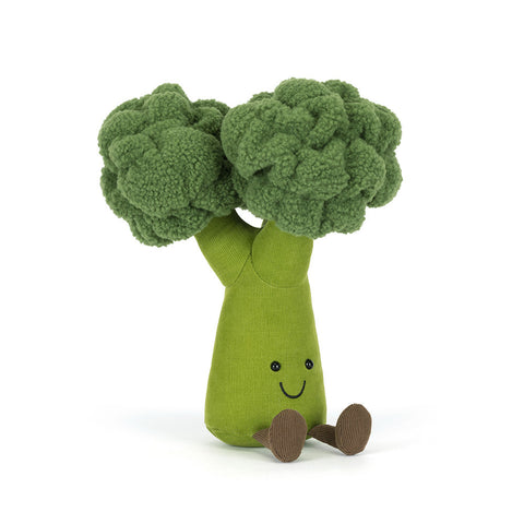 Plush toy shaped like a broccoli on a white background. It has a happy face and feet.