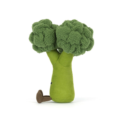 Side view of a plush broccoli-shaped toy