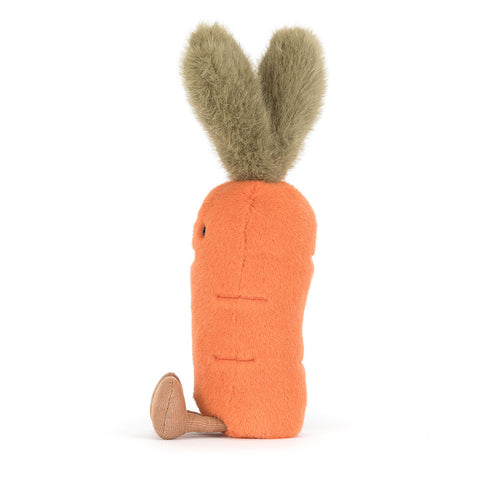 A side view of a plush carrot toy