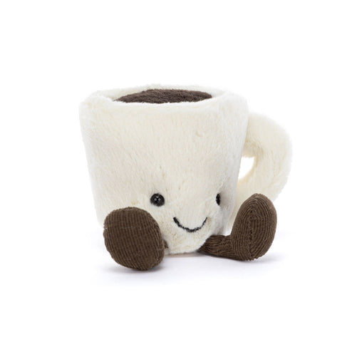 Stuffed white coffee cup with a smiling face, feet, and dark filling.