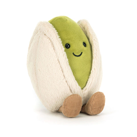 Image shows a stuffed pistachio inside a half open shell. It has a happy face and feet.