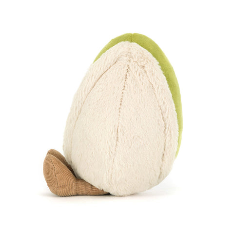 Image shows a side view of the stuffed pistachio