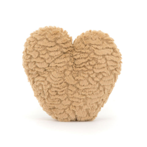 Back view of a plush heart-shaped pastry
