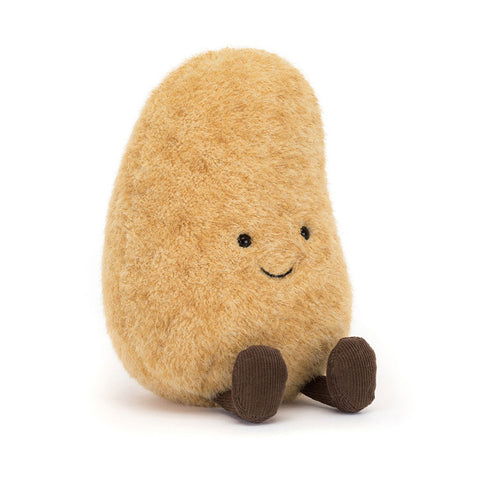 Plush toy shaped like a potato with a smiling face on a white background