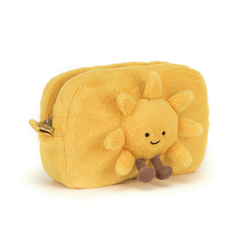 Image shows a plush, golden yellow zipper pouch. It has a 3D sun on the front with a happy face and feet.