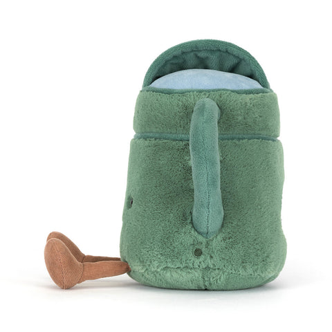 Side view of a plush green watering can