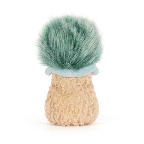 Back view of a plush peanut toy wearing a green fuzzy hat on a white background