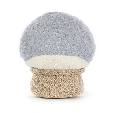 Back view of a plush snow globe toy on a white background