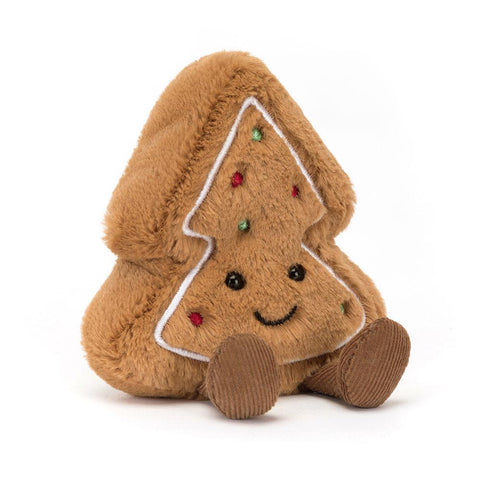 Plush gingerbread tree toy with a smiley face on a white background