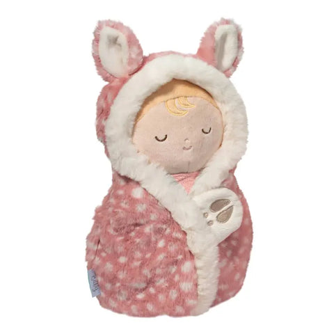 Image shows a soft doll swaddled in a pink fawn blanket