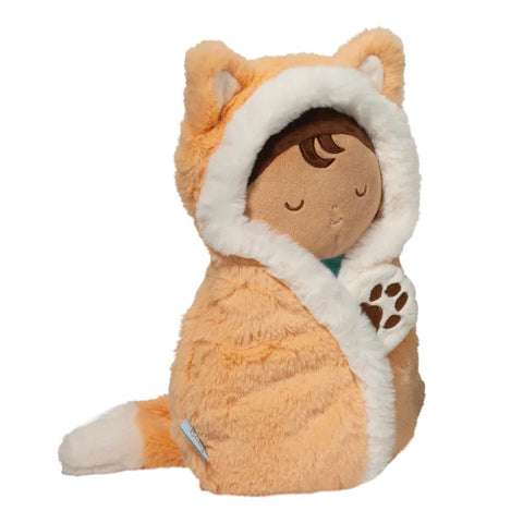 Image shows a doll swaddled in a soft fox blanket.