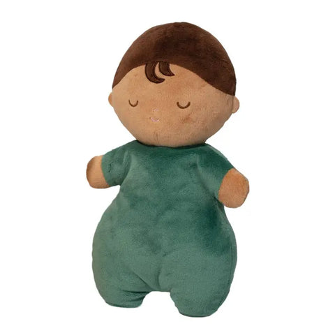 Image shows the stuffed doll. It has caramel-colored skin and dark brown hair. It is wearing a green outfit.