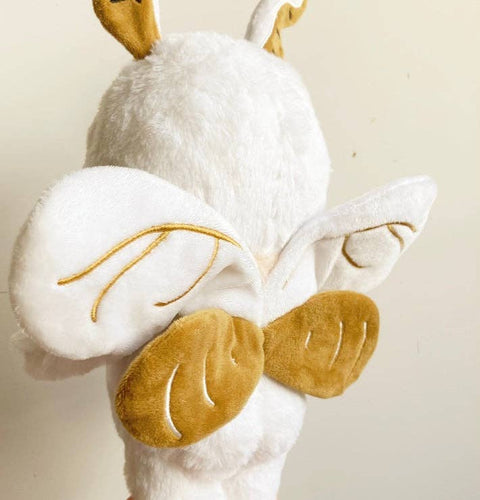 Back view of the plush baby poodle mothman