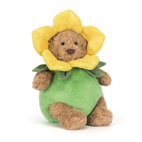 Plush teddy bear wearing a yellow daffodil costume