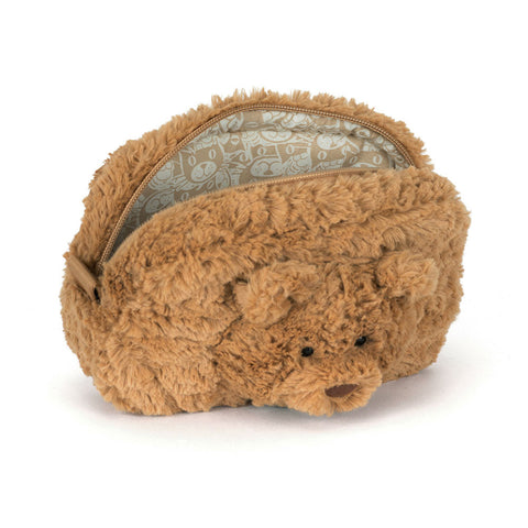 Image shows the plush teddy bear pouch unzipped. The inner fabric is a repeating Jellycat logo.