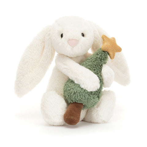 White plush bunny toy holding a Christmas tree with a gold star