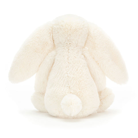 White plush bunny toy on a white background