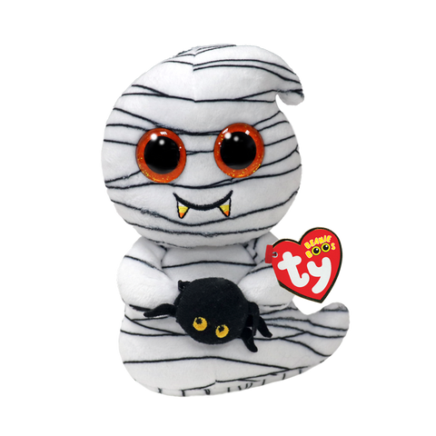 Image shows a ghost wearing a mummy costume. It is holding a spider and has large orange plastic eyes.