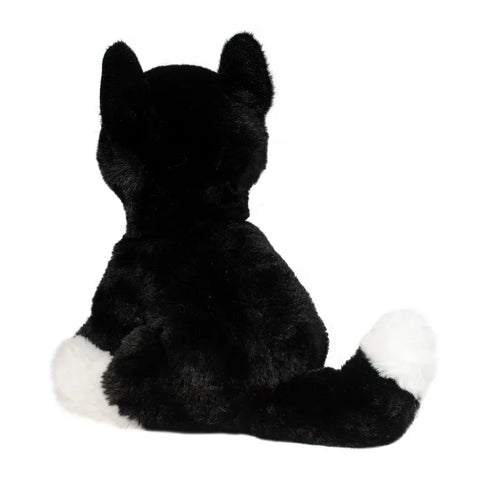 A back view of the plush black and white cat
