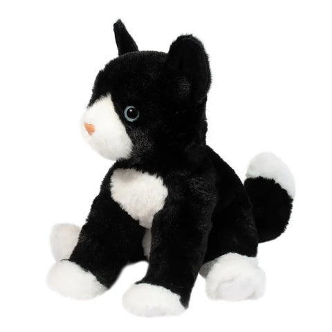 A front-angle view of the plush black and white cat