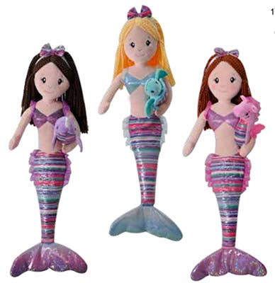 Image shows assorted stuffed mermaids holding assorted sea life