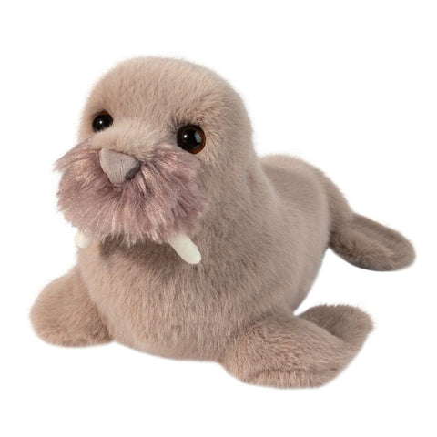 A plush walrus on a white background