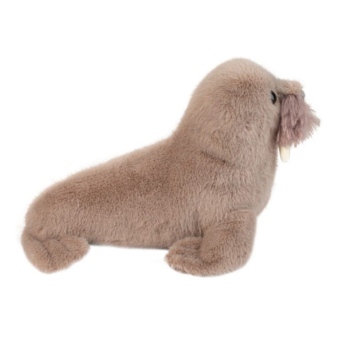 A side view of the plush walrus on a white background