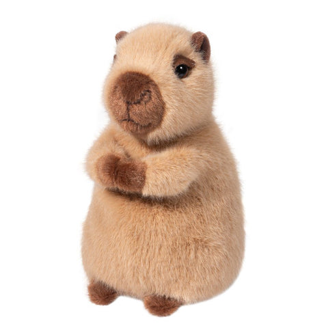 A plush capybara sitting up on its rear end