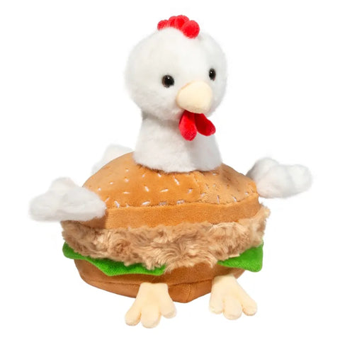A plush stuffed animal resembling a chicken sandwich with a sesame seed bun, lettuce, and a chicken filet. It has a chicken head, wings, tail, and feet.