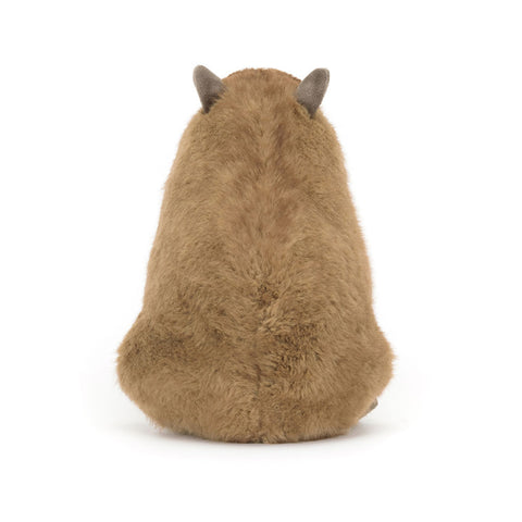 Back view of a plush toy capybara on a white background