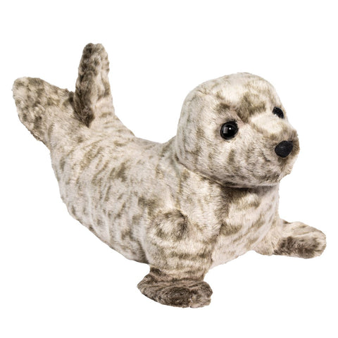 A plush brown speckled sea with black eyes on a white background