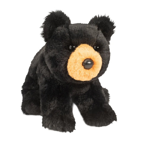 A plush black bear toy with a tan snout and black eyes and nose, sitting upright.