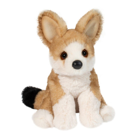 A plush Fennec Fox. It is white and brown with a black tipped tail and brown eyes.