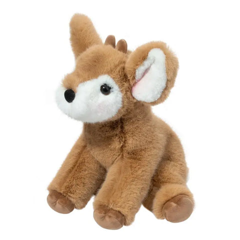 A side-angle view of the plush fawn