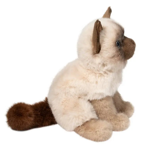 A side view of the plush siamese cat