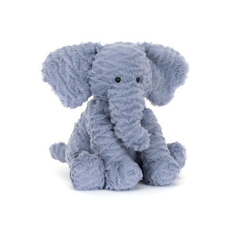 Image shows a fuzzy-looking blue stuffed elephant. It is seated.