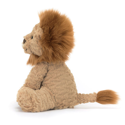 Image shows a side view of the stuffed lion