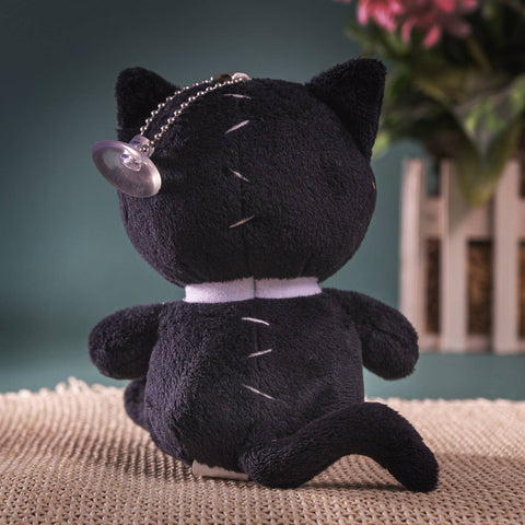 Image shows a back view of the spooky cat with its back stitched together. It has a chain with a suction cup attached to its head.