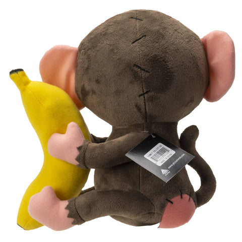 Image shows a back view of the monkey. Its head is stitched together, and its butt is stitched on.